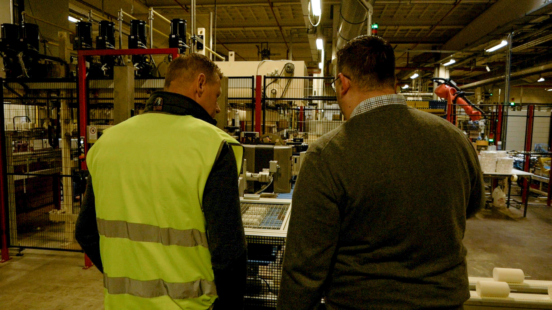 Spaas IT Engineer Nick explaining how the machinery in the factory works